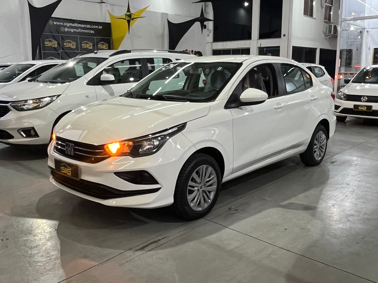 FIAT CRONOS 1.3 FIREFLY FLEX DRIVE MANUAL 2024 Branco - Miniatura 4 - SIG Multimarcas