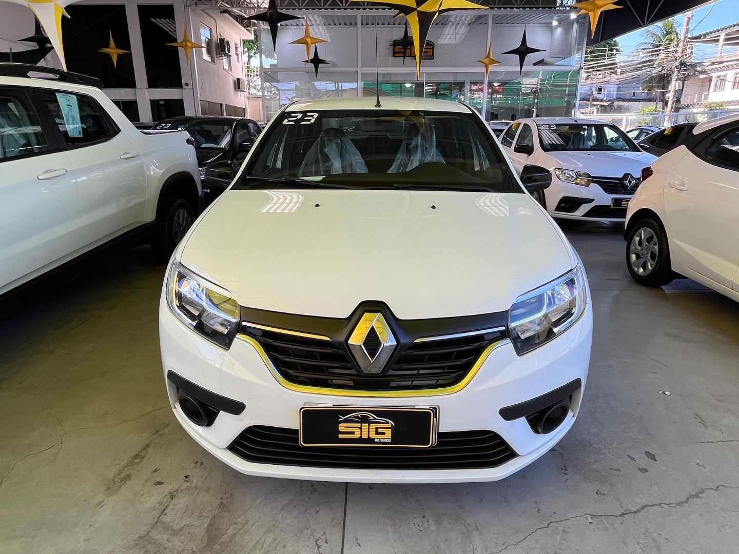 RENAULT LOGAN 1.0 12V SCE FLEX ZEN MANUAL 2023 Branco - Miniatura 2 - SIG Multimarcas