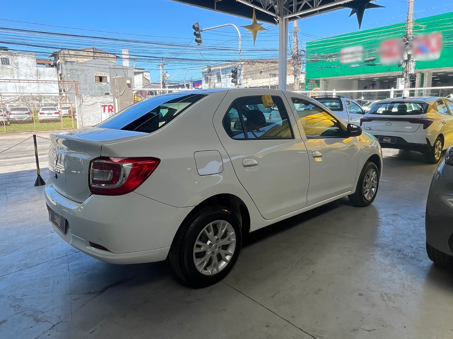 RENAULT LOGAN 1.0 12V SCE FLEX ZEN MANUAL 2023 Branco - Miniatura 8 - SIG Multimarcas