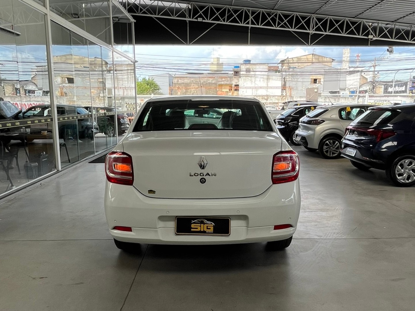 RENAULT LOGAN 1.0 12V SCE FLEX ZEN MANUAL 2023 Branco - Miniatura 3 - SIG Multimarcas