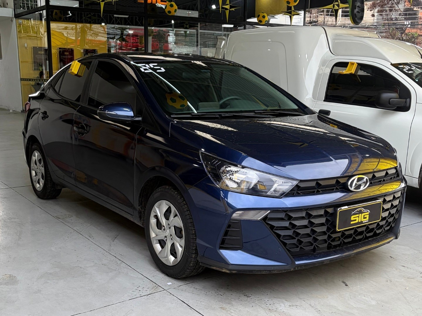 HYUNDAI HB20S 1.0 12V FLEX COMFORT PLUS MANUAL 2025 Azul seminovo à venda em Duque de Caxias - Miniatura Traseira - SIG Multimarcas
