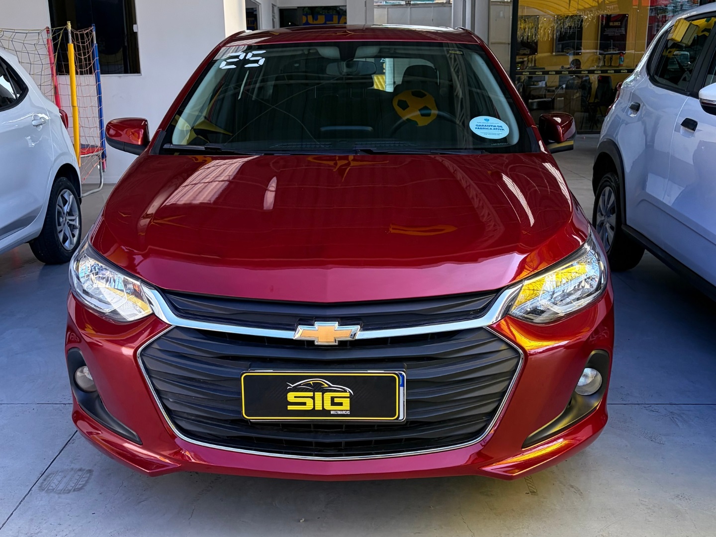 CHEVROLET ONIX 1.0 FLEX LT MANUAL 2025 Vermelho seminovo à venda em Duque de Caxias - Miniatura Lateral - SIG Multimarcas