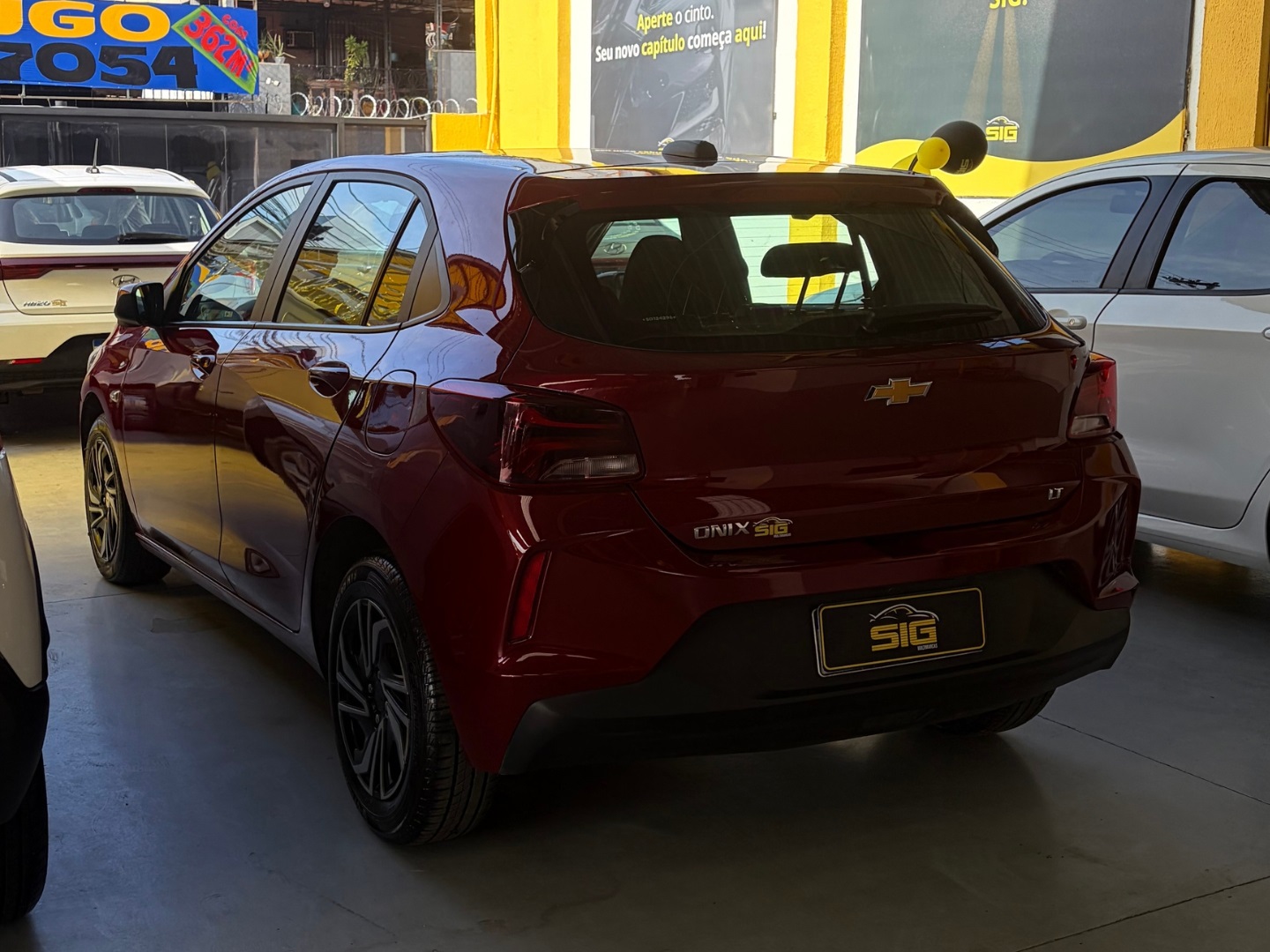 CHEVROLET ONIX 1.0 FLEX LT MANUAL 2025 Vermelho seminovo à venda em Duque de Caxias - Miniatura Detalhe - SIG Multimarcas