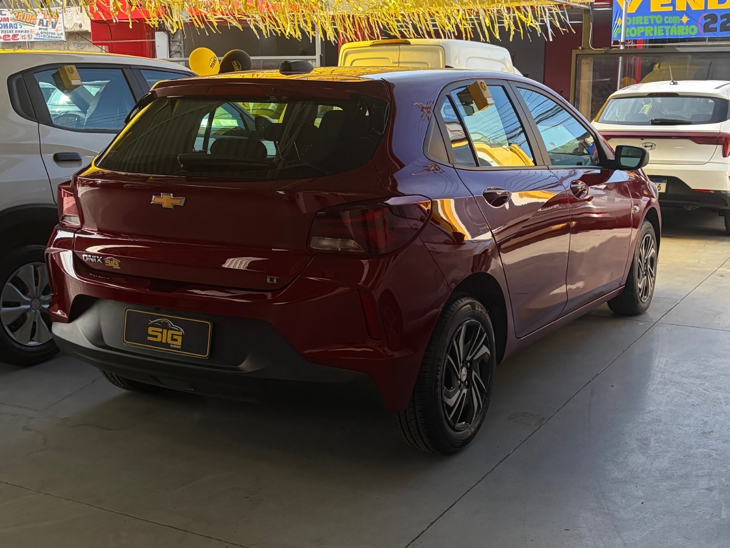 CHEVROLET ONIX 1.0 FLEX LT MANUAL 2025 Vermelho seminovo à venda em Duque de Caxias - Miniatura Vista 6 - SIG Multimarcas